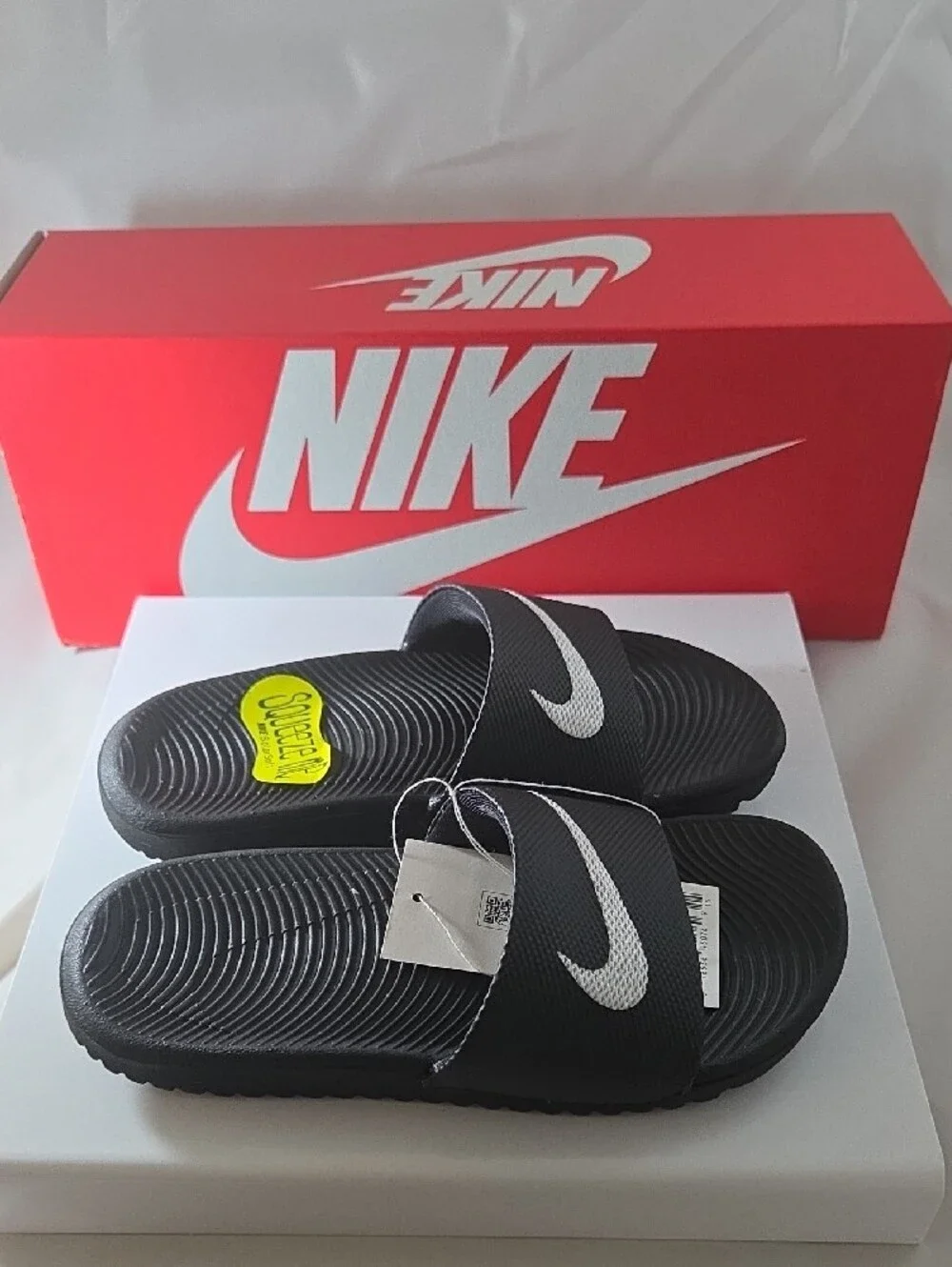 Nike Kids Black Slide Sandals with White Swoosh